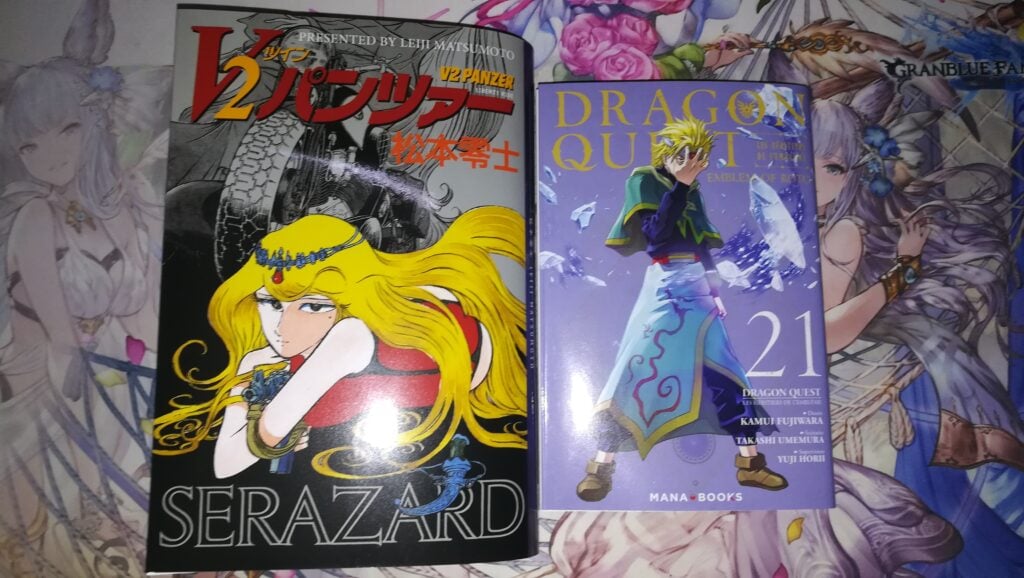 Photo des couvertures des mangas V2 Panzer et du tome 21 de Dragon Quest Emblem of Roto tome 21